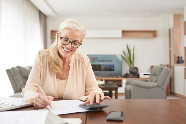 What is an Expense Report Woman Working on an Expense Report
